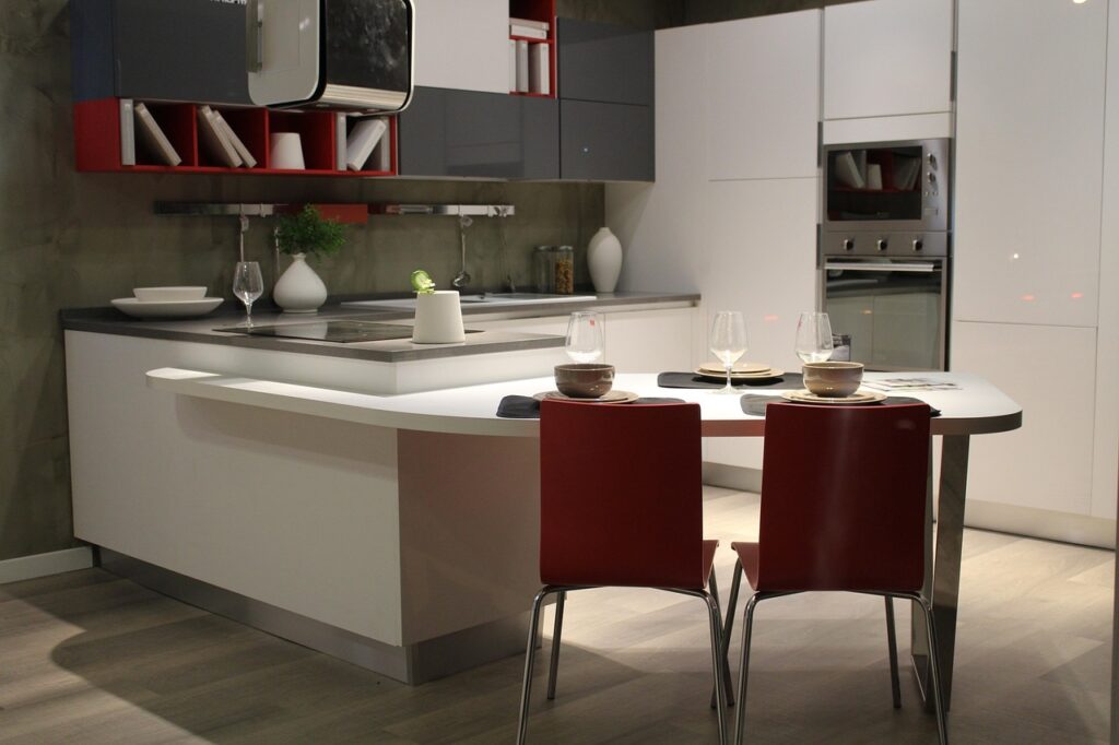 kitchen nook with red chairs after Corian countertop installation GTA