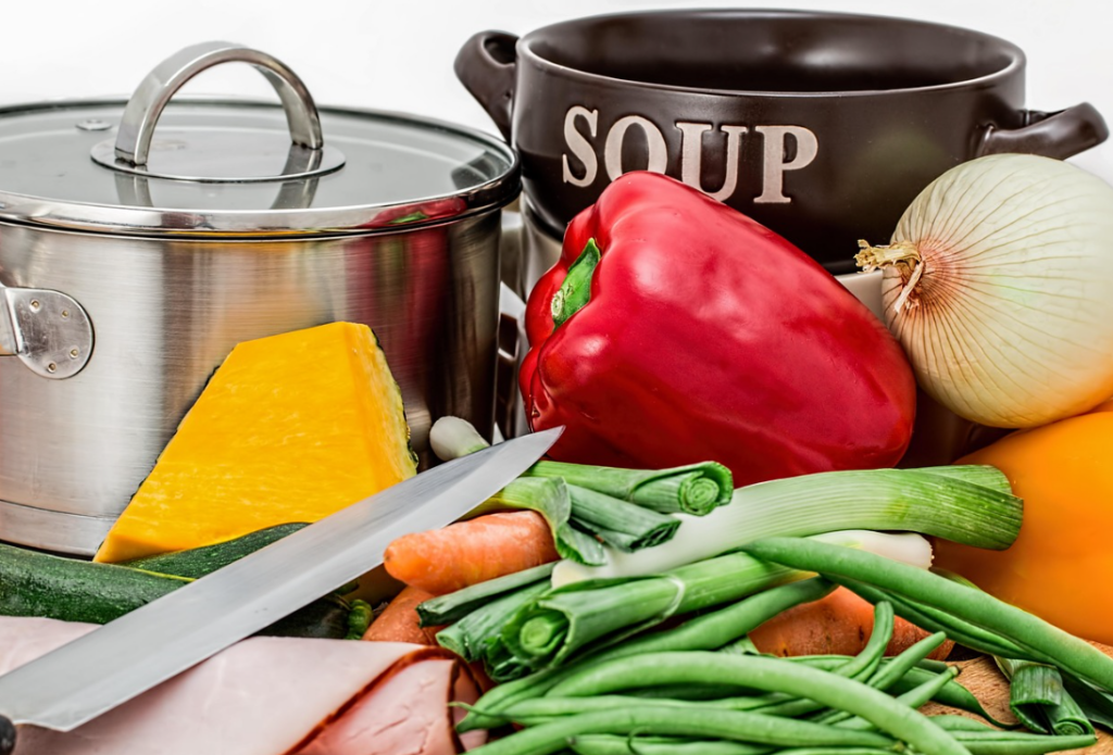 pots and food on solid surface countertops